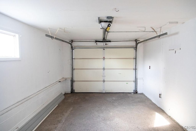 4114 Wetzel Rd, Clay, NY 13090 - garage featuring a garage door opener