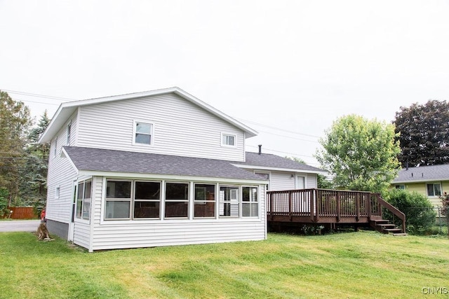 4114 Wetzel Rd, Clay, NY 13090 - back of house featuring a shingled roof, a wooden deck, and a lawn