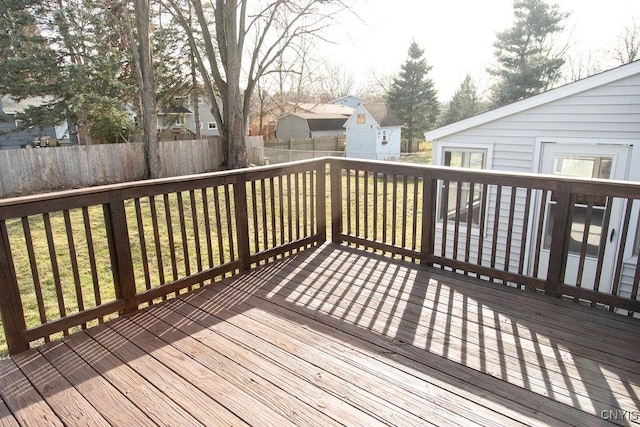 4114 Wetzel Rd, Clay, NY 13090 - wooden deck featuring a fenced backyard and a residential view