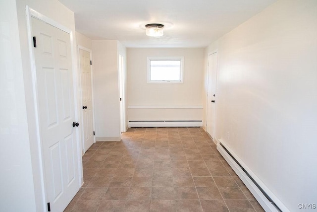4114 Wetzel Rd, Clay, NY 13090 - hallway with a baseboard heating unit and baseboard heating