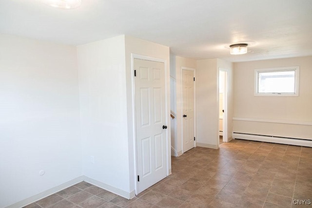 4114 Wetzel Rd, Clay, NY 13090 - spare room with baseboard heating and baseboards