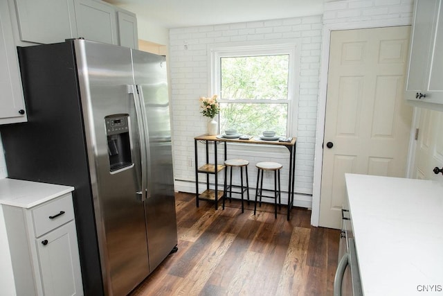 4114 Wetzel Rd, Clay, NY 13090 - kitchen with stainless steel fridge with ice dispenser, baseboard heating, light countertops, and dark wood finished floors