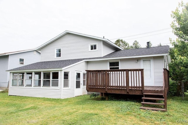 4114 Wetzel Rd, Clay, NY 13090 - rear view of property with a shingled roof, a deck, and a lawn