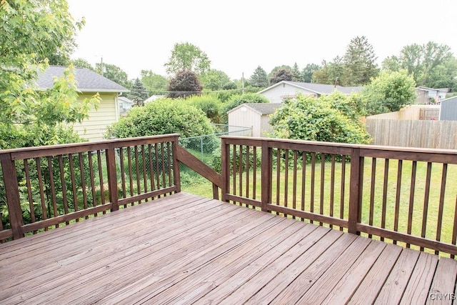 4114 Wetzel Rd, Clay, NY 13090 - deck with a fenced backyard and a storage unit