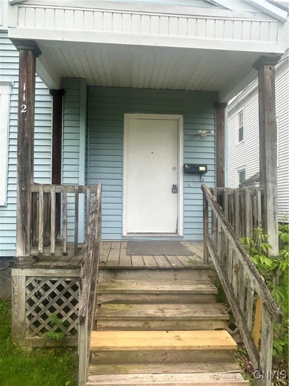 114 Mark Ave Unit 2, Syracuse, NY 13205 - doorway to property featuring a porch