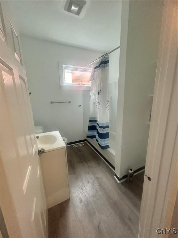 114 Mark Ave Unit 2, Syracuse, NY 13205 - bathroom featuring wood finished floors and vanity