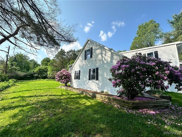 876 Hittown Rd, Caton, NY 14871 - view of home's exterior with a yard