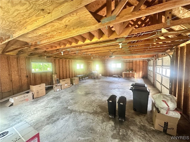 876 Hittown Rd, Caton, NY 14871 - misc room featuring a garage and plenty of natural light