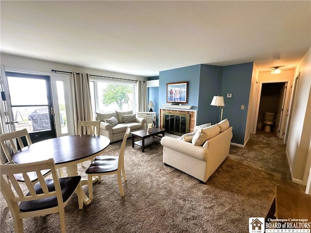 23 Seneca Dr, Chautauqua, NY 14728 - living area featuring carpet flooring and a brick fireplace