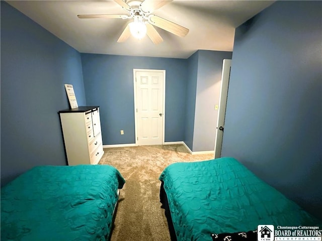 23 Seneca Dr, Chautauqua, NY 14728 - bedroom with light colored carpet and a ceiling fan