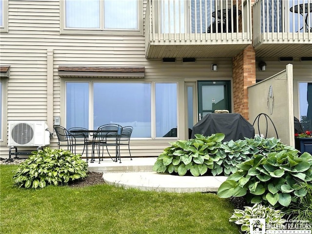 23 Seneca Dr, Chautauqua, NY 14728 - rear view of house with a balcony and a patio area