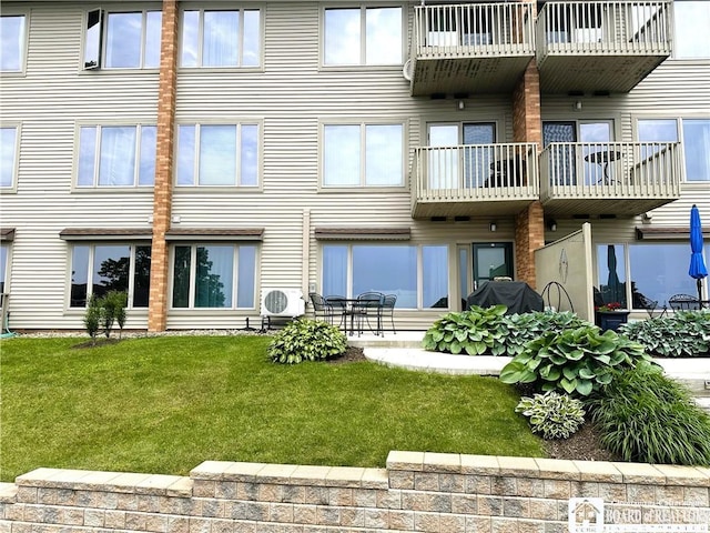 23 Seneca Dr, Chautauqua, NY 14728 - back of property featuring a balcony and a yard