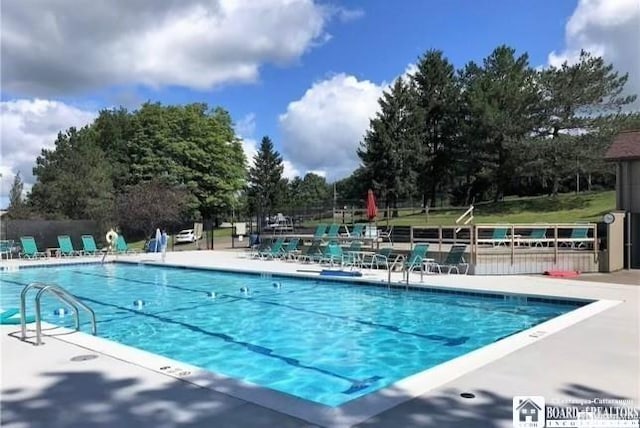 23 Seneca Dr, Chautauqua, NY 14728 - community pool with a patio area and view of scattered trees