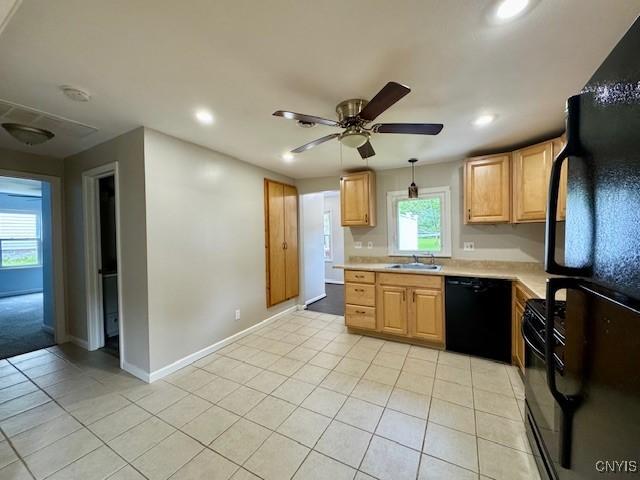4079 Onondaga Blvd, Onondaga, NY 13031 - kitchen featuring black appliances, light countertops, recessed lighting, light brown cabinets, and light tile patterned floors