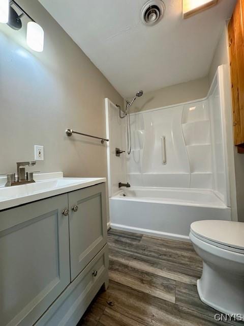4079 Onondaga Blvd, Onondaga, NY 13031 - bathroom featuring vanity, wood finished floors, and  shower combination
