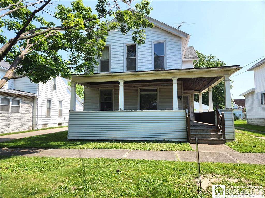 14 N Beagle St, Dunkirk, NY 14048 - view of front of property with covered porch and a front yard