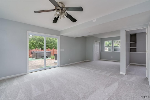 40 Phyllis Ln, Hastings, NY 13076 - unfurnished bedroom with access to exterior, light colored carpet, and a ceiling fan