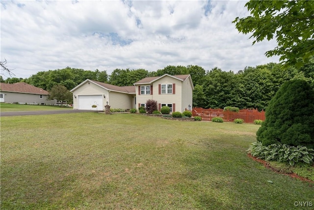 40 Phyllis Ln, Hastings, NY 13076 - view of front of house featuring driveway and an attached garage