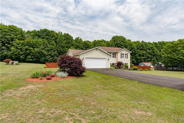 40 Phyllis Ln, Hastings, NY 13076 - view of front facade featuring asphalt driveway and an attached garage