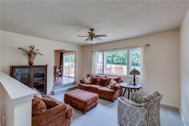 40 Phyllis Ln, Hastings, NY 13076 - living area with carpet flooring, ceiling fan, and a textured ceiling