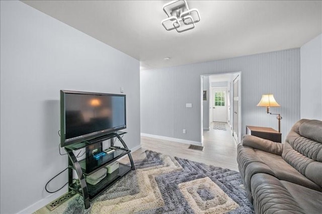 1135 Ridge Rd, Hamden, NY 13782 - living area with baseboards and wood finished floors