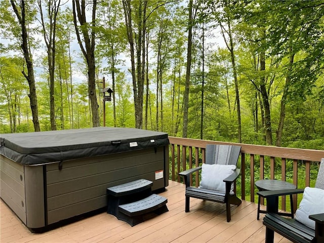 735 Howell Rd, Conquest, NY 13140 - wooden deck with a hot tub