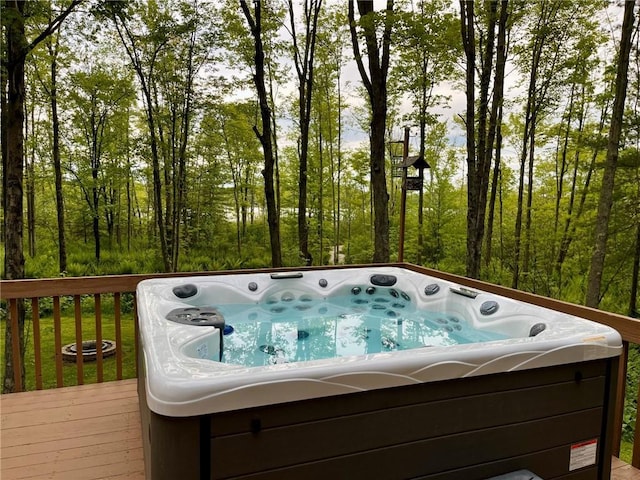 735 Howell Rd, Conquest, NY 13140 - deck featuring a hot tub
