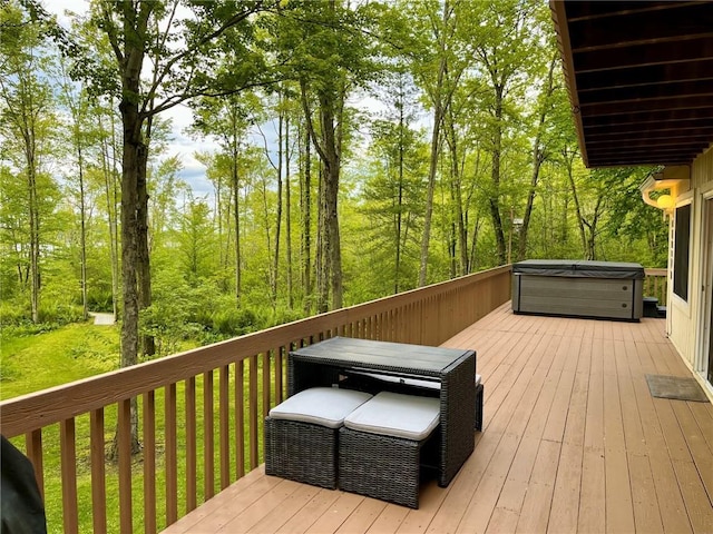 735 Howell Rd, Conquest, NY 13140 - wooden deck with a hot tub
