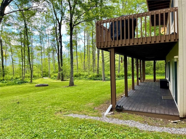 735 Howell Rd, Conquest, NY 13140 - view of green lawn featuring a wooden deck