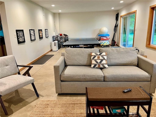 735 Howell Rd, Conquest, NY 13140 - living area with recessed lighting and concrete flooring