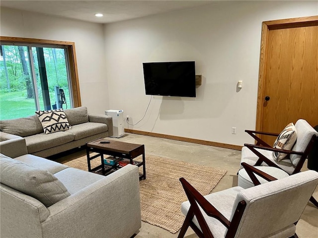 735 Howell Rd, Conquest, NY 13140 - living area with concrete flooring and recessed lighting