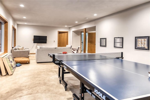 735 Howell Rd, Conquest, NY 13140 - playroom with finished concrete flooring, recessed lighting, and crown molding