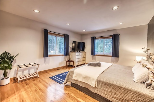 735 Howell Rd, Conquest, NY 13140 - bedroom featuring wood finished floors and recessed lighting