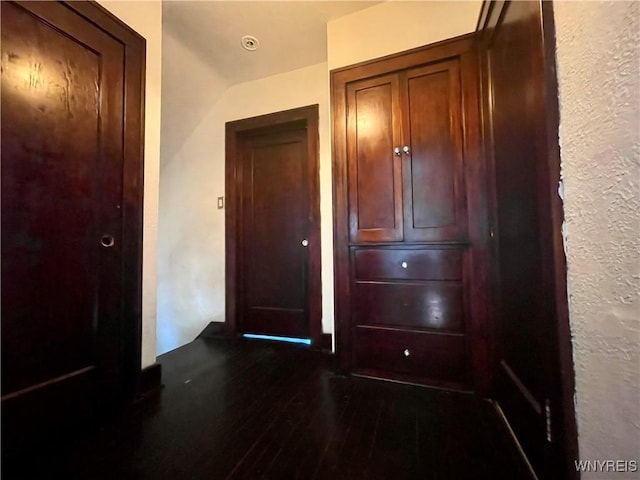 2010 Niagara St, Niagara Falls, NY 14303 - hallway with dark wood-style flooring and a textured wall