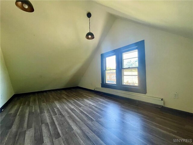 2010 Niagara St, Niagara Falls, NY 14303 - bonus room featuring baseboard heating, vaulted ceiling, and dark wood-style floors