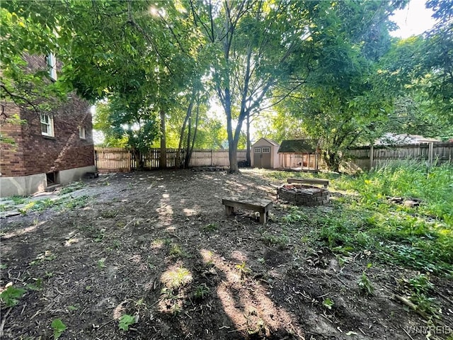 2010 Niagara St, Niagara Falls, NY 14303 - fenced backyard with a storage unit