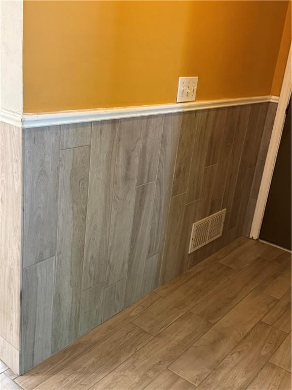 94 Brookhaven, Rochester, NY 14621 - detailed view of a wainscoted wall and wood finished floors