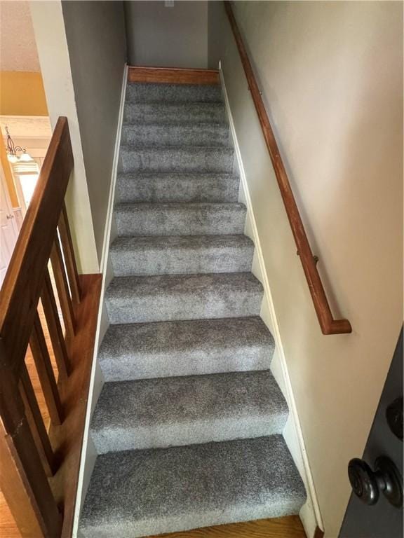 94 Brookhaven, Rochester, NY 14621 - staircase featuring wood finished floors
