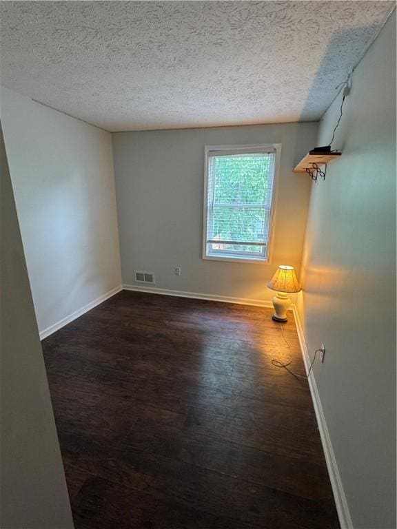 94 Brookhaven, Rochester, NY 14621 - empty room with a textured ceiling and wood finished floors