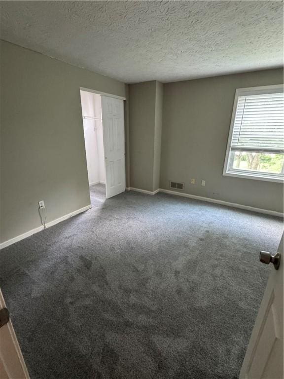 94 Brookhaven, Rochester, NY 14621 - unfurnished room with carpet and a textured ceiling