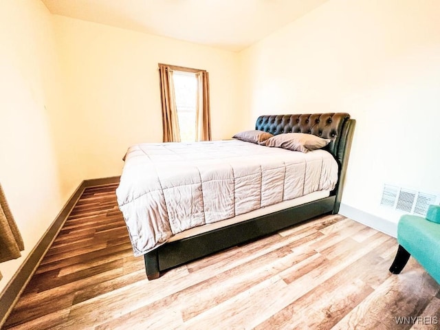 2218 Ferry Ave, Niagara Falls, NY 14301 - bedroom featuring wood finished floors and baseboards
