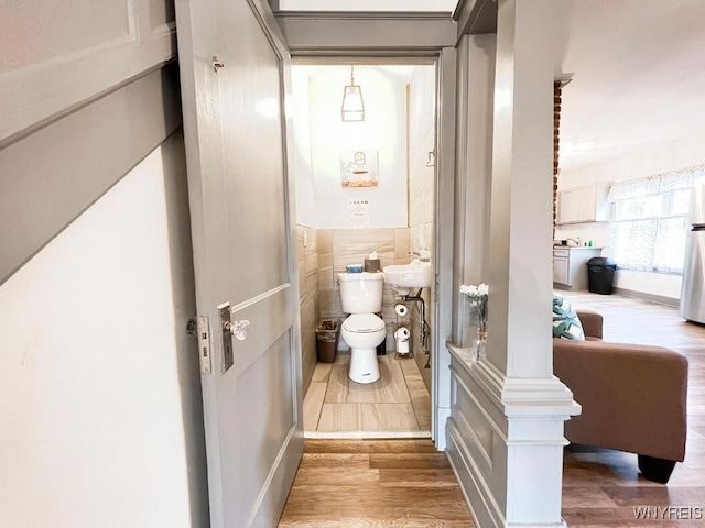 2218 Ferry Ave, Niagara Falls, NY 14301 - bathroom with toilet and wood finished floors