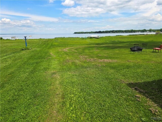 9395 Lakeshore View Rd, Sullivan, NY 13037 - view of property's community featuring a water view and a fire pit