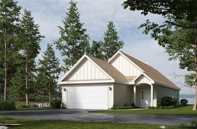 9395 Lakeshore View Rd, Sullivan, NY 13037 - view of front of home featuring board and batten siding, driveway, an attached garage, roof with shingles, and a front lawn