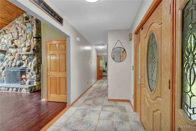 2328 Gowanda Zoar Rd, Collins, NY 14070 - foyer entrance with baseboards and a fireplace