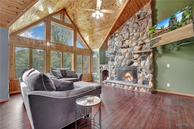 2328 Gowanda Zoar Rd, Collins, NY 14070 - living area with a stone fireplace, wood-type flooring, a ceiling fan, wooden ceiling, and high vaulted ceiling