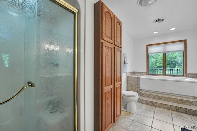2328 Gowanda Zoar Rd, Collins, NY 14070 - full bath featuring tile patterned flooring, an enclosed shower, a bath, and recessed lighting