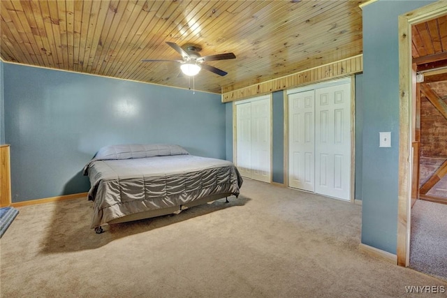 2328 Gowanda Zoar Rd, Collins, NY 14070 - carpeted bedroom with two closets, wood ceiling, and a ceiling fan