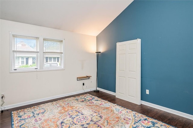 39 Castleford Rd, Greece, NY 14616 - unfurnished room featuring dark wood-style floors and lofted ceiling