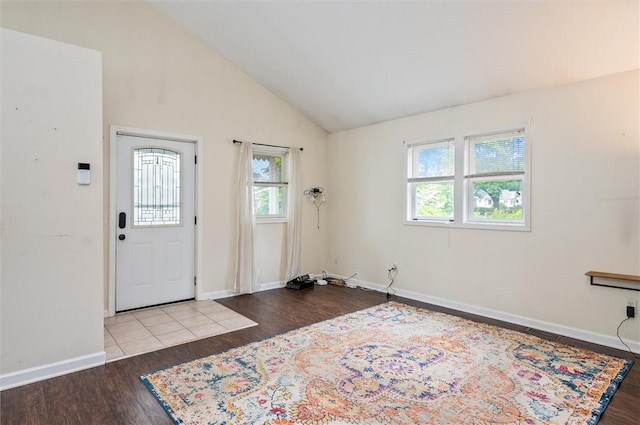 39 Castleford Rd, Greece, NY 14616 - entryway featuring wood finished floors and vaulted ceiling